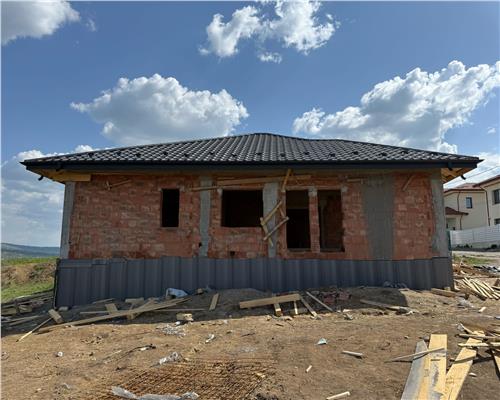Casa plan parter de vanzare in zona Bucium Visan