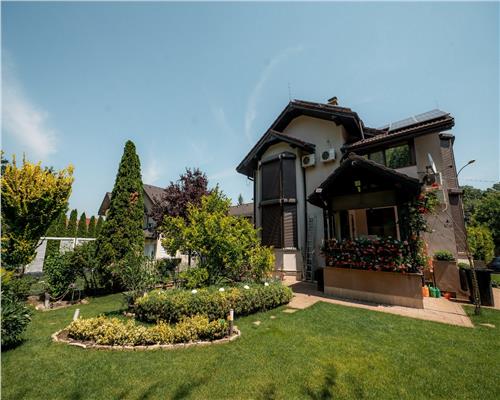 Casa deosebita cu gradina amenajata si panouri fotovoltaice – Bucium Post Control
